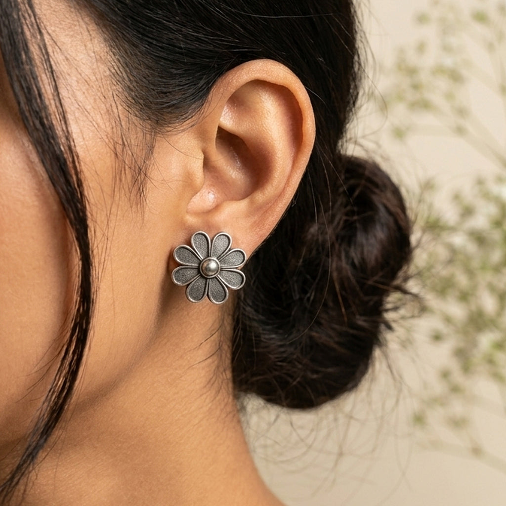 Twin Blossom Silver Studs worn on the ear, handmade by Dream Karigiri