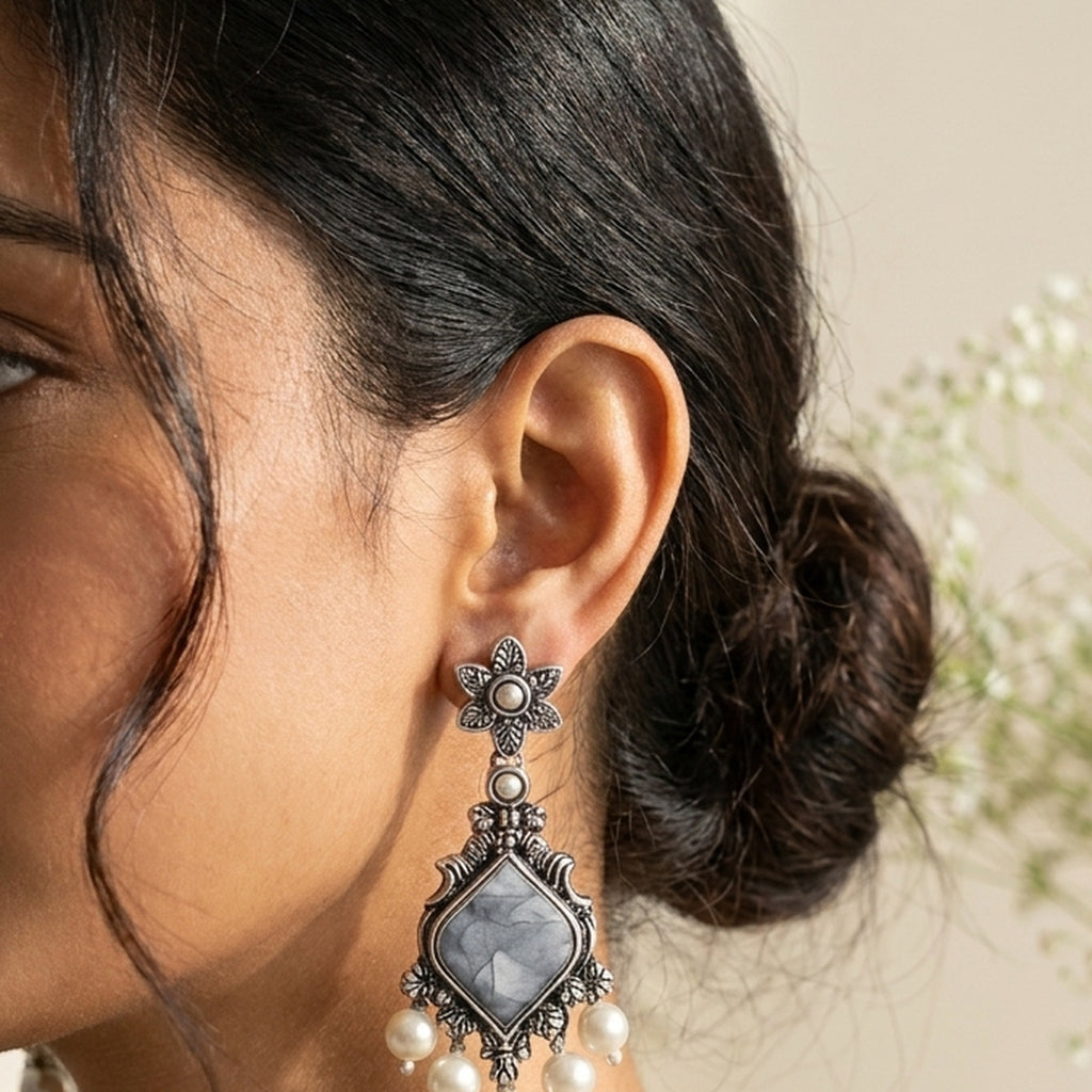 Grey Stone Square Statement Earrings worn on the ear, handmade by Dream Karigiri