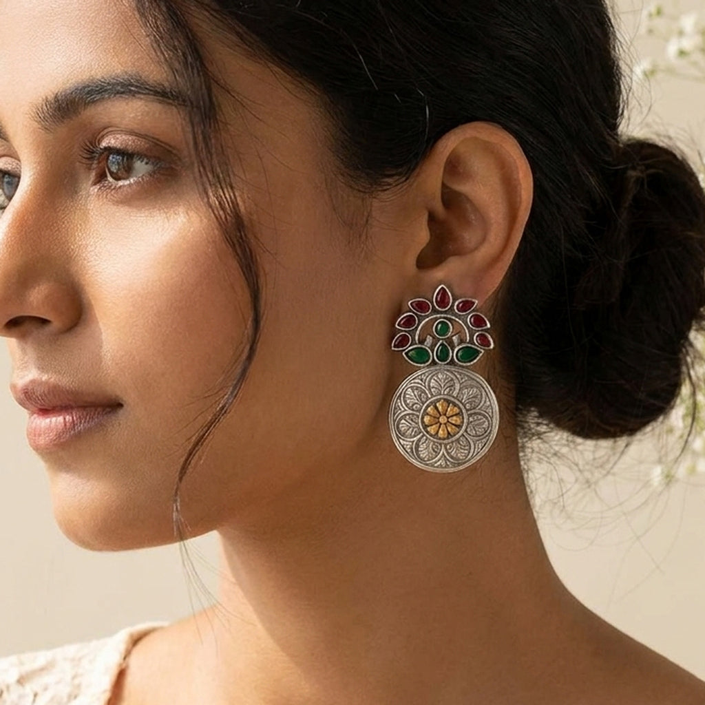Rajwadi Red & Green Kundan Studs worn on the ear, handmade by Dream Karigiri