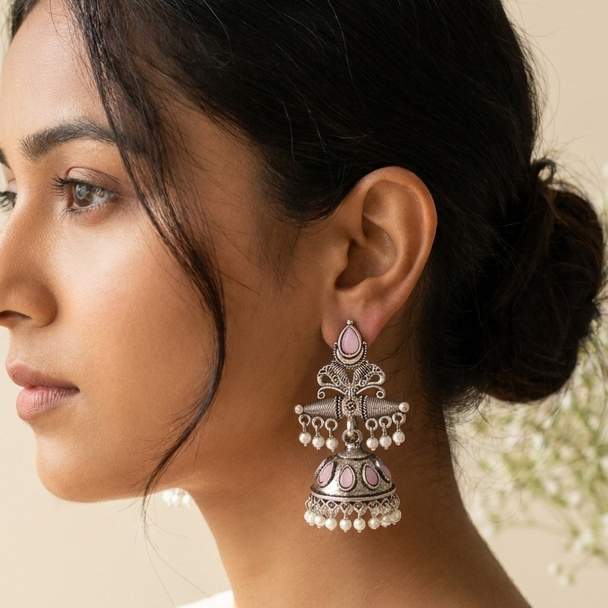 Oxidized Silver Jhumka - Pink worn on the ear, handmade by Dream Karigiri