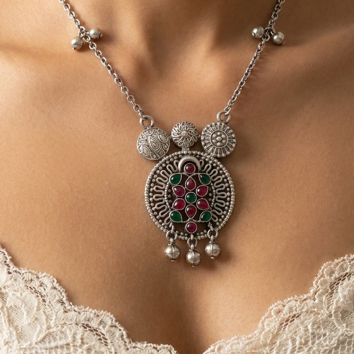 Desi Diva Oxidized Red & Green Stone Necklace worn at the neck, handmade by Dream Karigiri