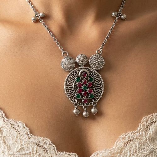Desi Diva Oxidized Red & Green Stone Necklace worn at the neck, handmade by Dream Karigiri