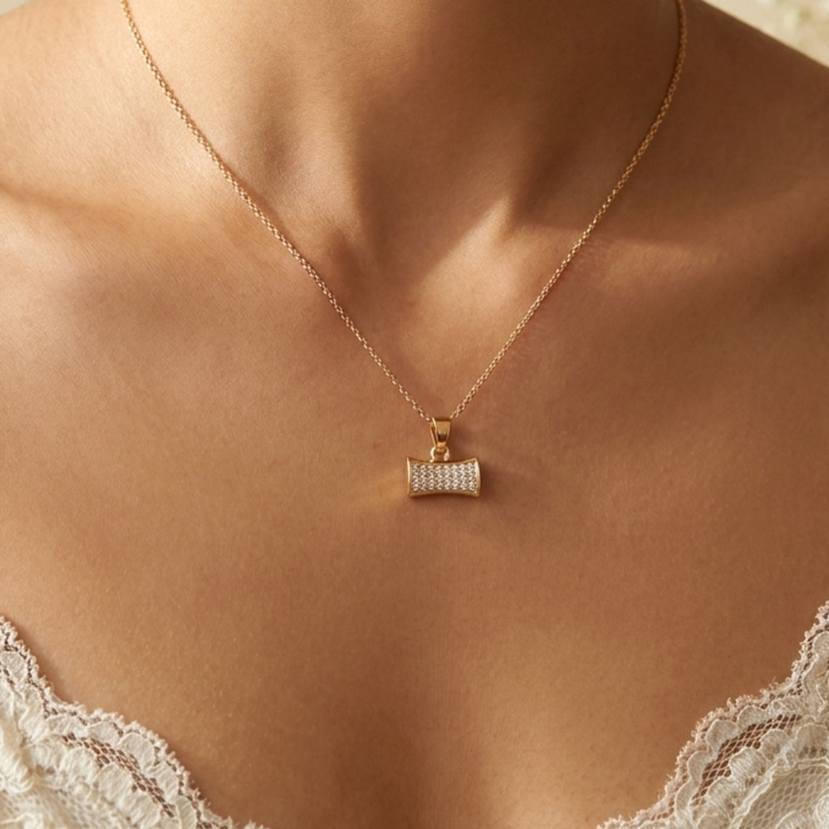 Dream Karigiri Rectangle Rose Gold Pendant worn at the neck, handmade by Dream Karigiri