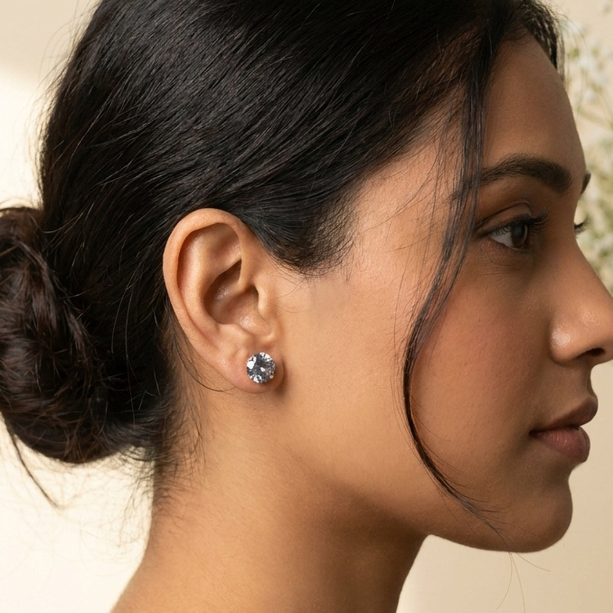 Dream Karigiri Solitaire Stud Earrings worn on the ear, handmade by Dream Karigiri